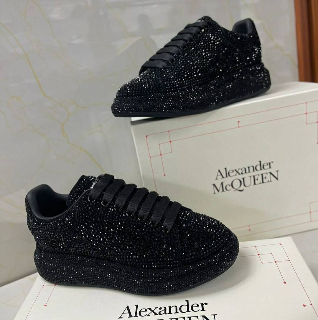 Oversize in black with rhinestones