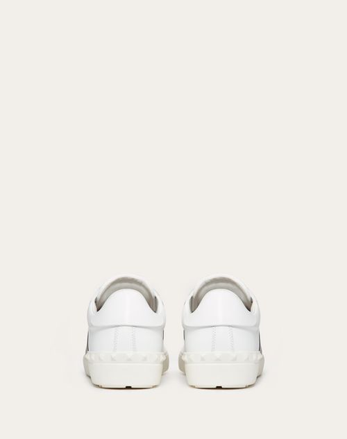 Open white sneakers