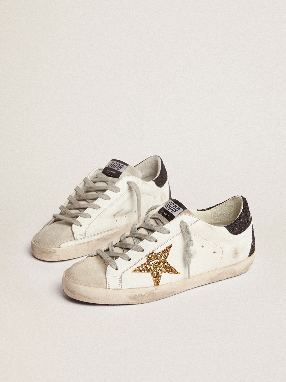 Super-Star LTD mit goldenem Stern und schwarzer Glitzer-Fersenlasche