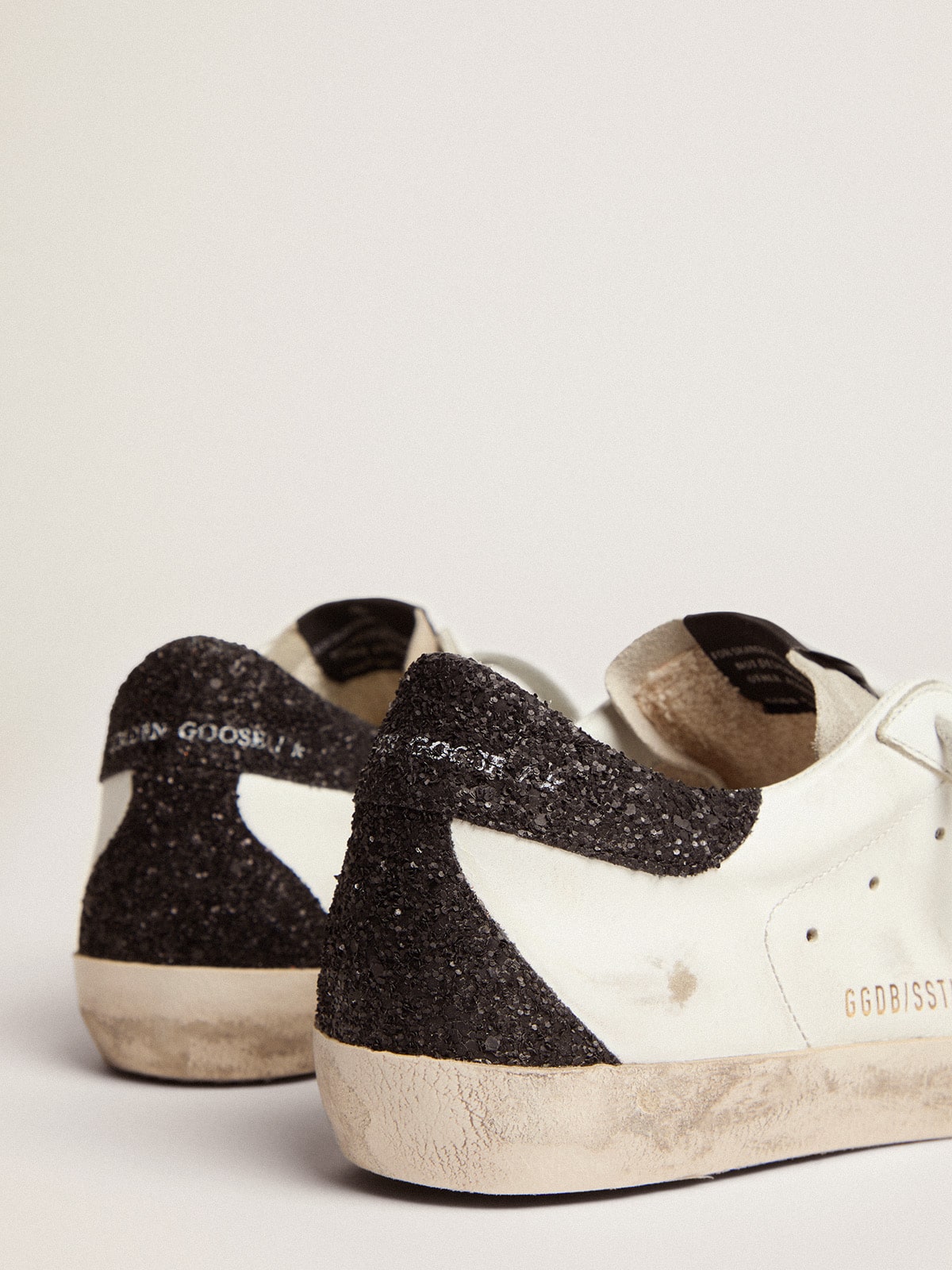 Super-Star LTD mit goldenem Stern und schwarzer Glitzer-Fersenlasche