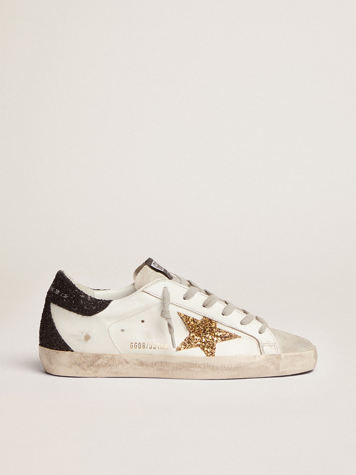 Super-Star LTD mit goldenem Stern und schwarzer Glitzer-Fersenlasche