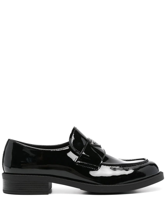Black triangular logo leather loafers