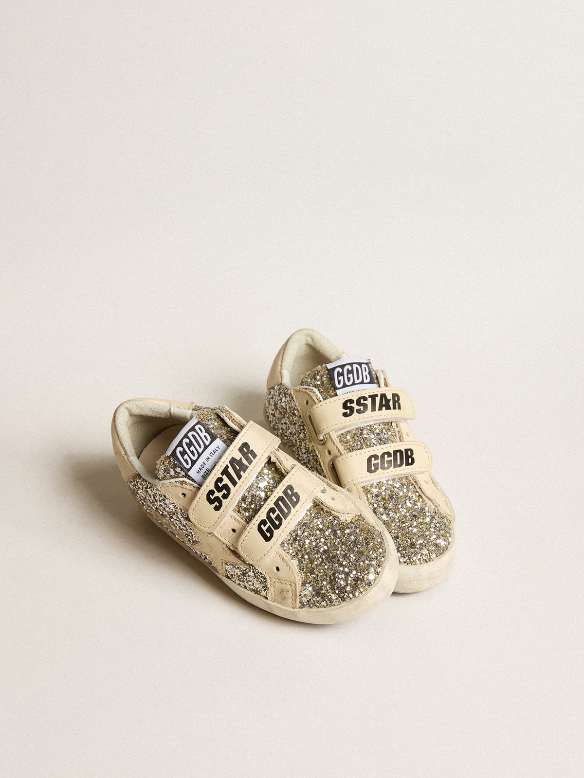 Old School Young in platinum glitter with star and leather heel