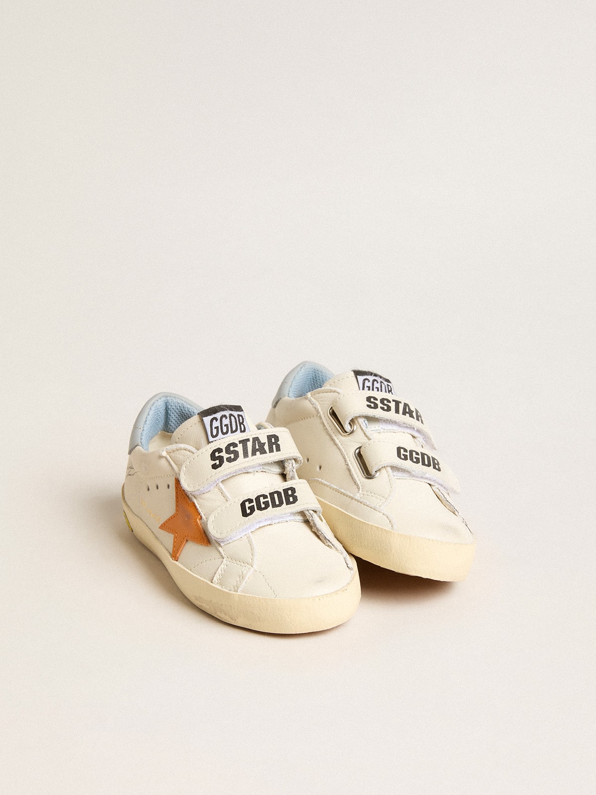 Old School Young in leather with orange star and sugar paper heel tab
