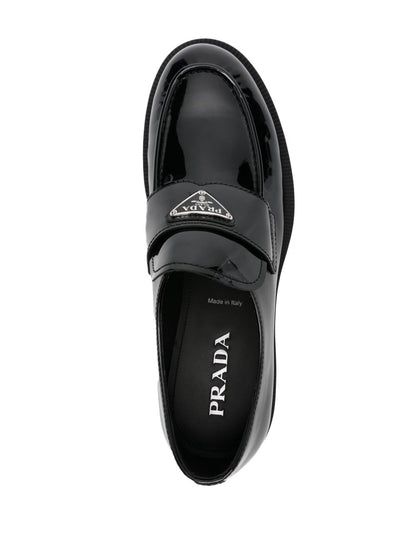 Black triangular logo leather loafers