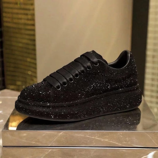 Oversize in black with rhinestones