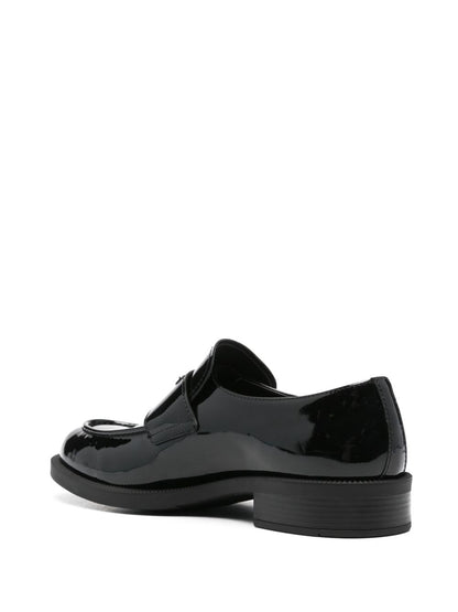 Black triangular logo leather loafers