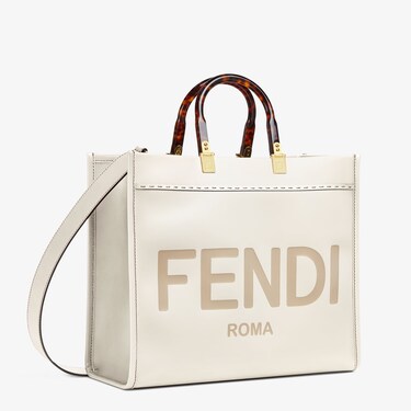 Sunshine Media in white leather