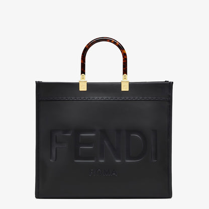 Sunshine Media in black leather