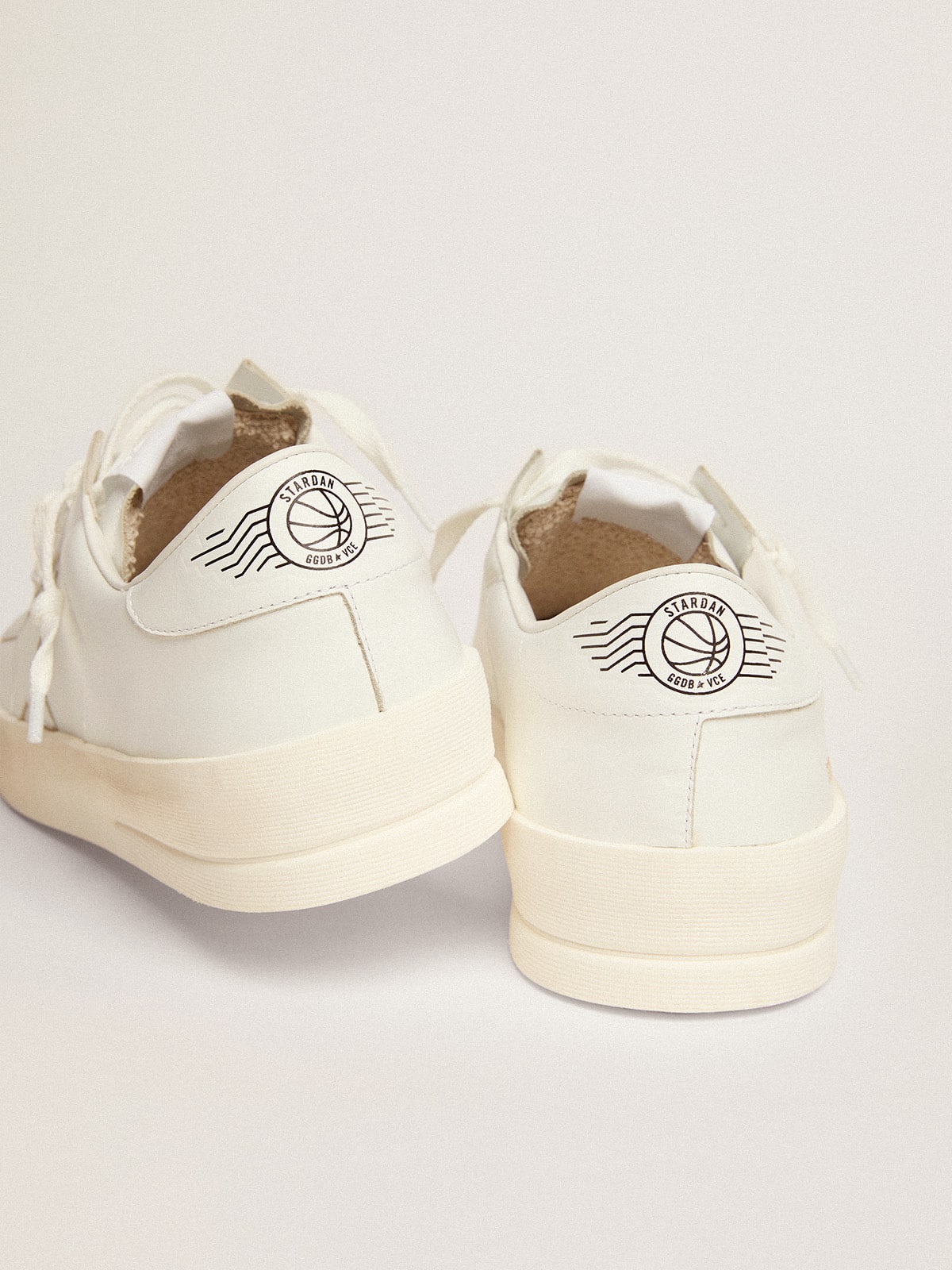 Stardan in white leather