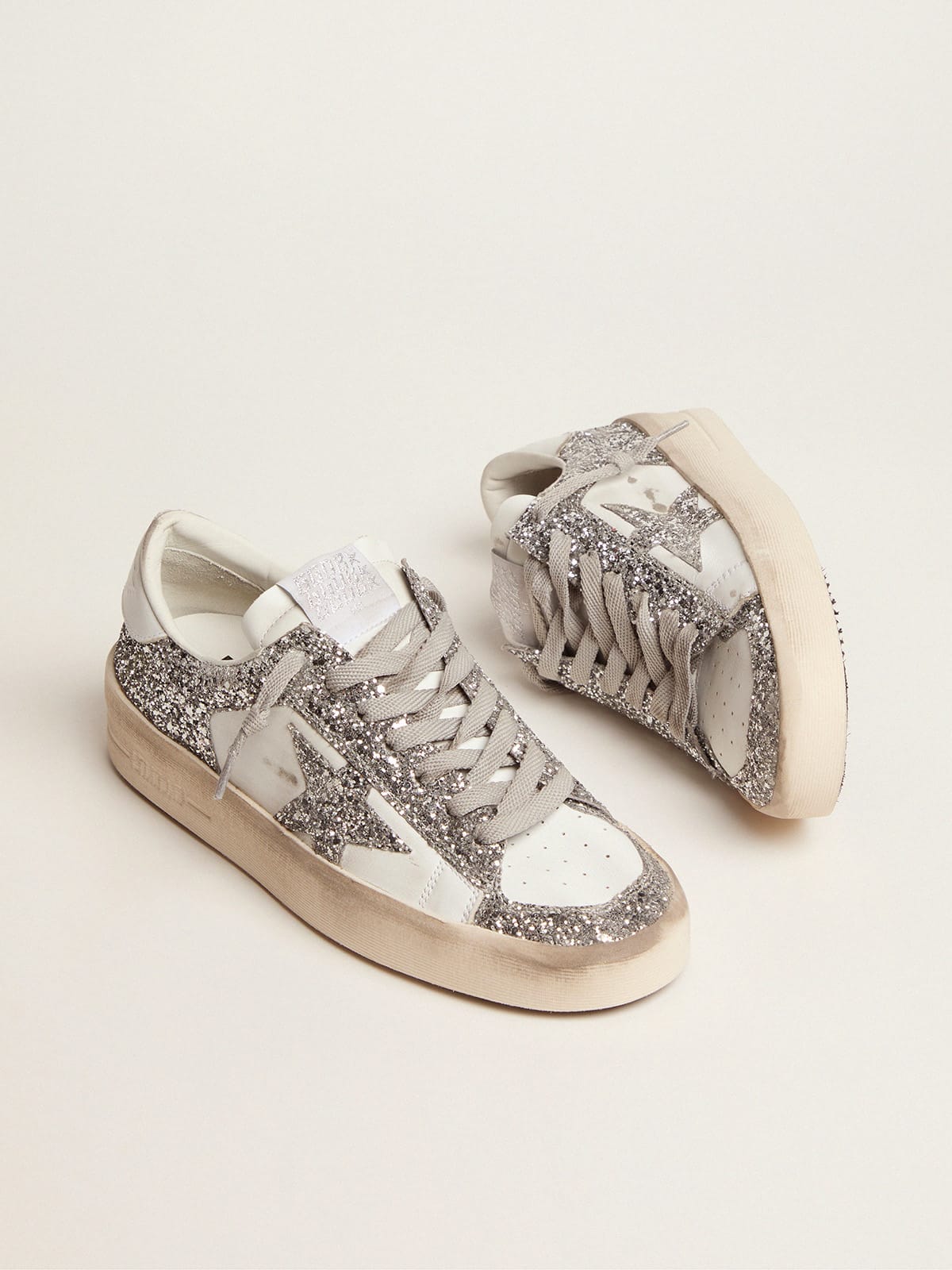 Stardan in white leather and glitter
