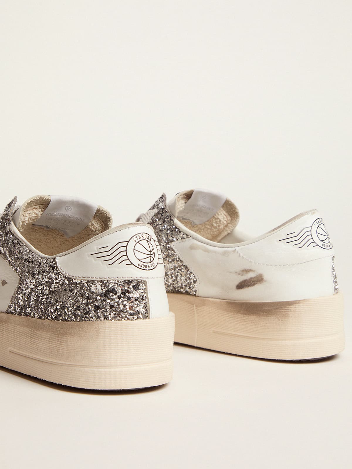 Stardan in white leather and glitter
