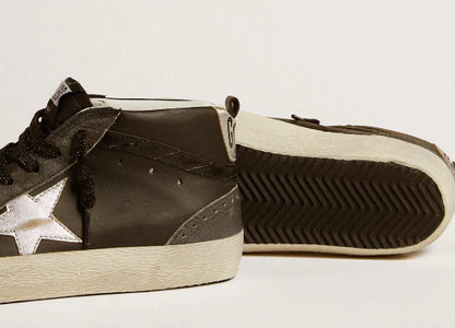 Mid Star in black leather with silver laminated leather star