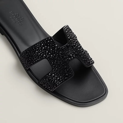 Oran Schwarze Glitzer-Sandalen