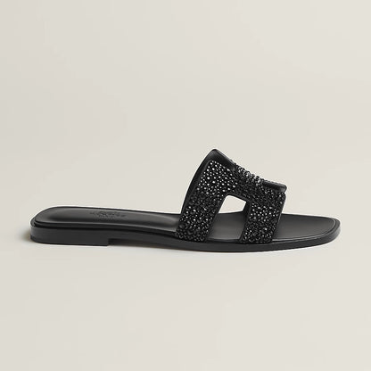 Oran Schwarze Glitzer-Sandalen